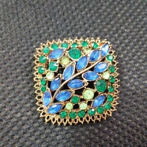 Elegant Gold and Blue Leaf Brooch
